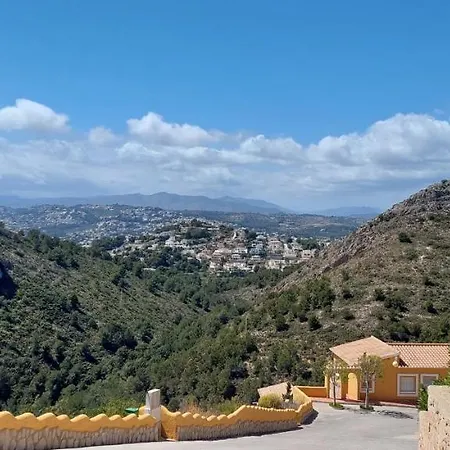 Апартаменты Casa Esme Cumbre Del Sol - Spacious 3bed 2bathroom With Fantastic Views And Pool Бенитачель